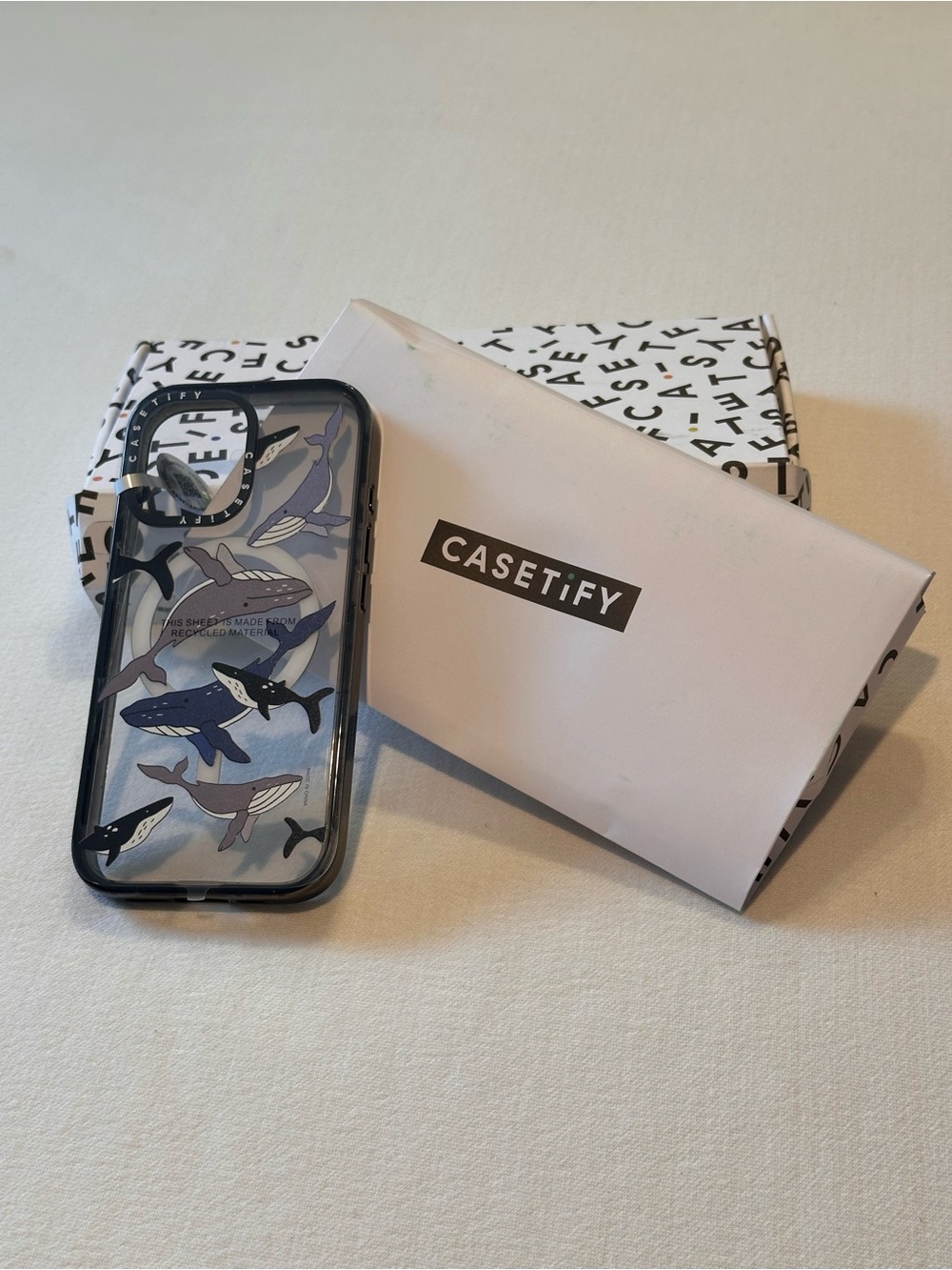 Casetify Black Bumper Clear iPhone 17 Case with Blue Whale Pattern
